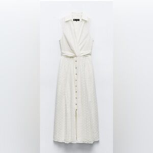 Sleeveless white eyelet dress